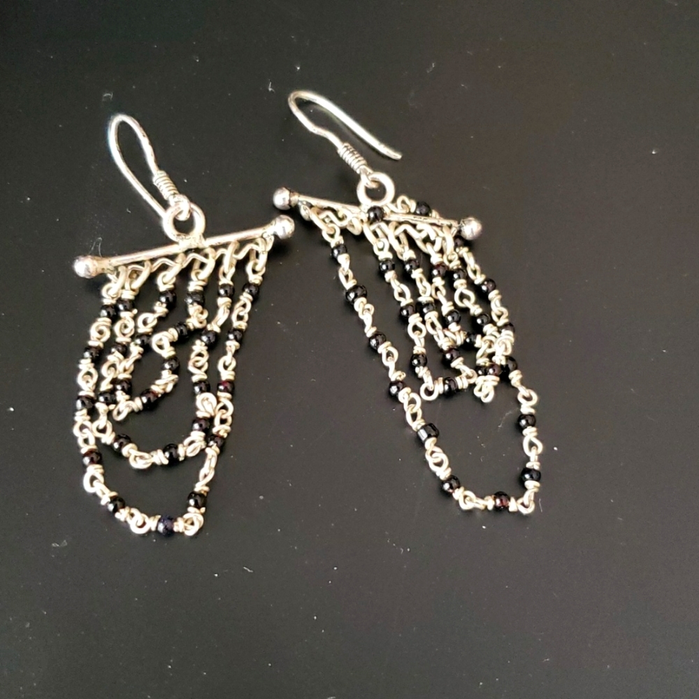 Never worn, sterling silver and black beads dangler earrings